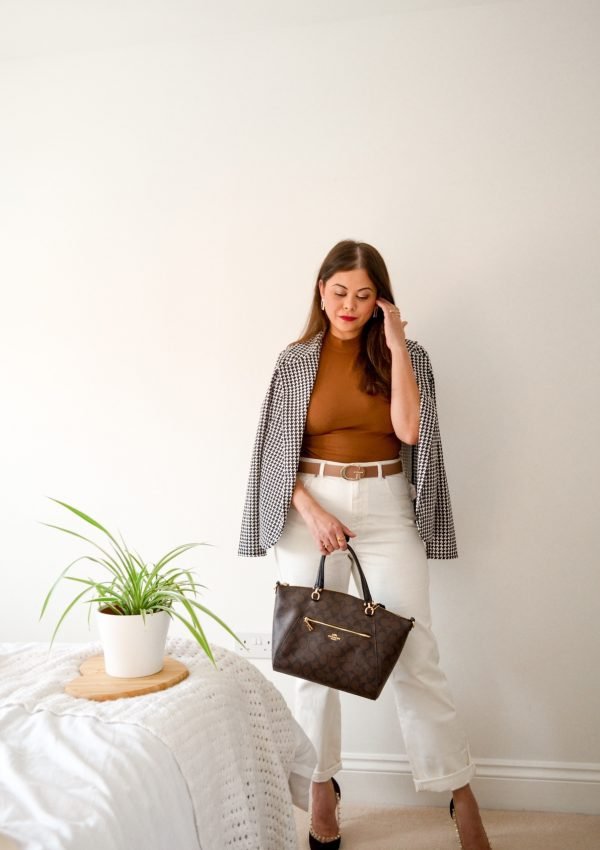 Spring outfit with french style white jeans with brown zara halter top guess belt houndstooth blazer and coach bag