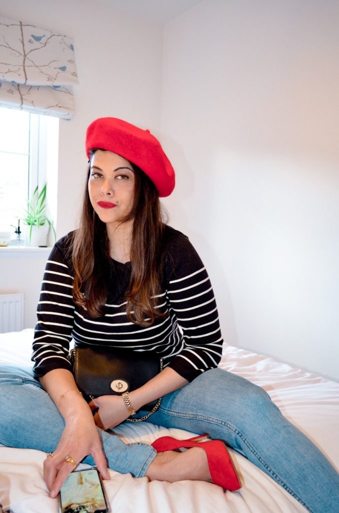 French style Neutral outfit with blue jeans, red beret and breton stripes. How to dress like a French girl , French style tips