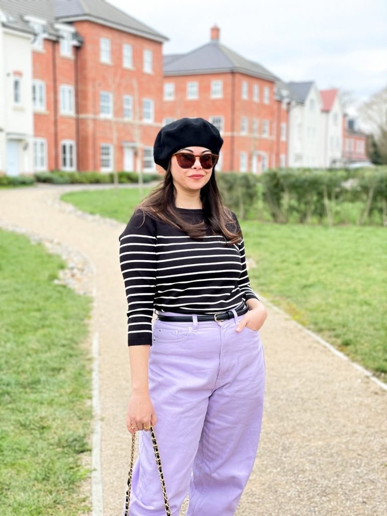French style Mom jeans outfit with Purple trousers and striped fine knit jumper with a black beret