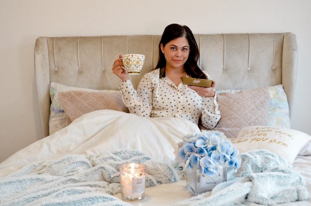 Romantic date idea for lockdown, please your wife with some breakfast in bed , betty's tea and biscuits candles and some beautifully decorated flowers 