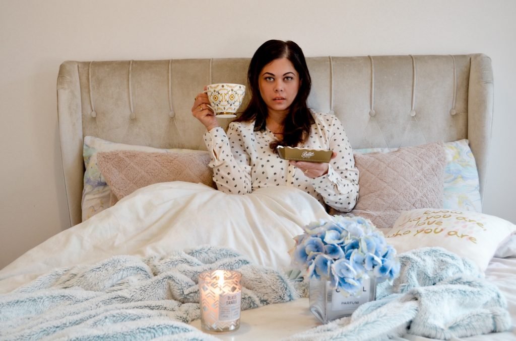 Romantic date idea for lockdown, please your wife with some breakfast in bed , betty's tea and biscuits candles and some beautifully decorated flowers 