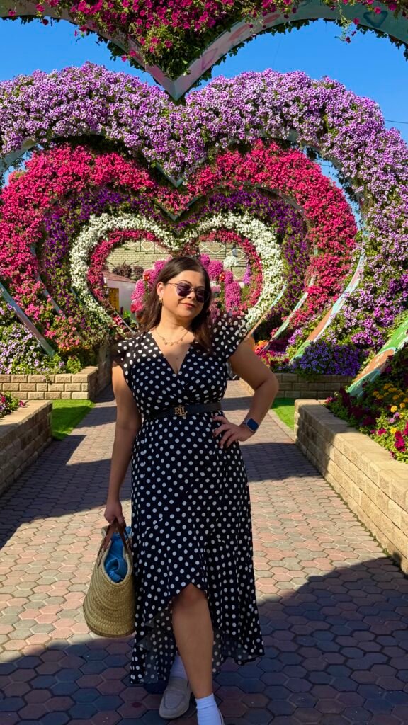 A woman smiling at the camera at Dubai Miracle Garden