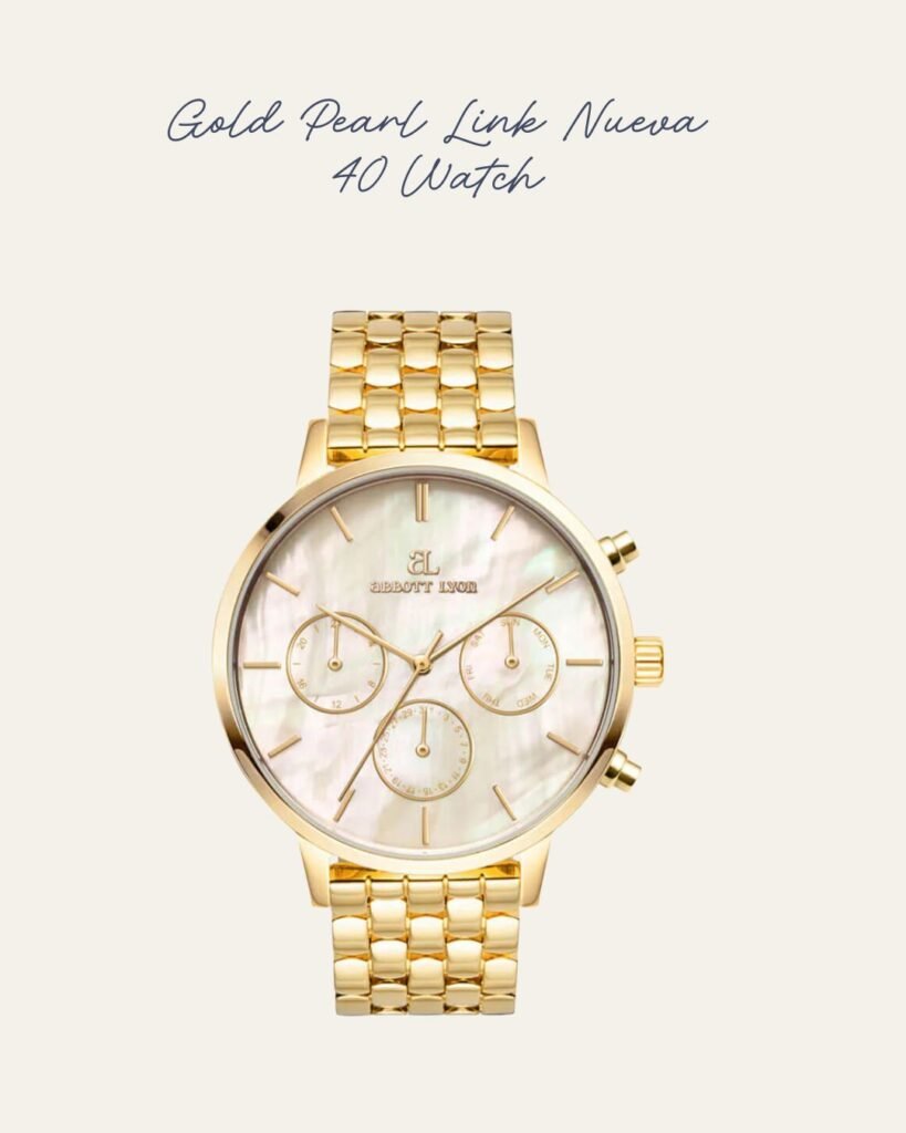 Gold watch by Abbott Lyon with a pearly dial